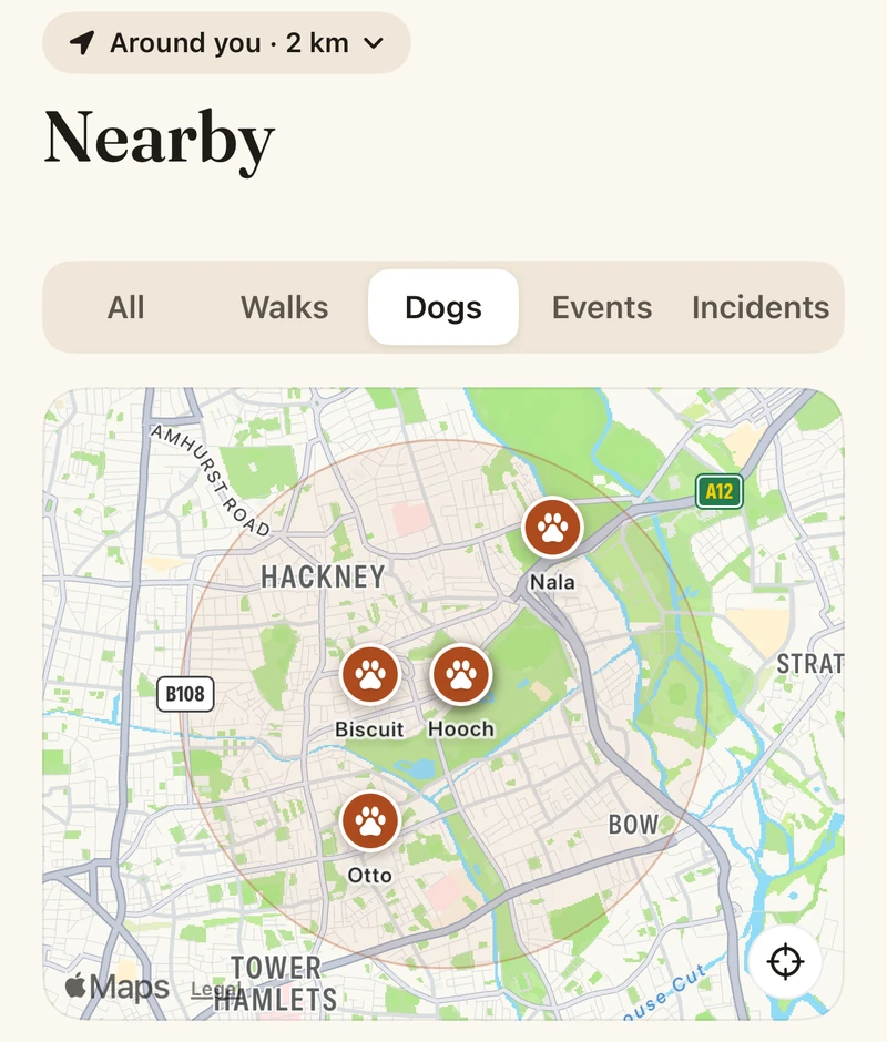 The Nearby screen: a map with dogs pinned inside a circle.